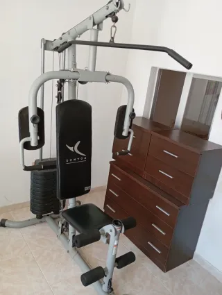 Máquina de remo y accesorios gimnasio