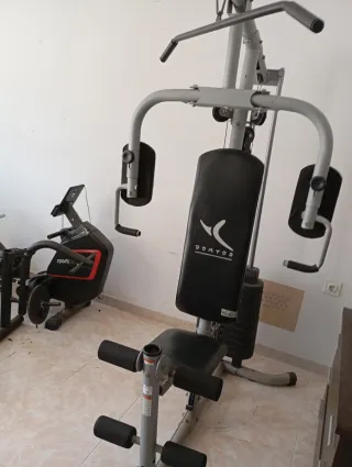 Máquina de remo y accesorios gimnasio