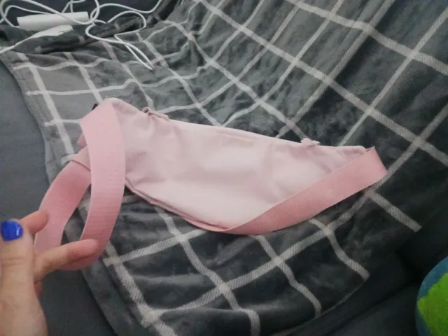 Riñonera Nike rosa y dorada