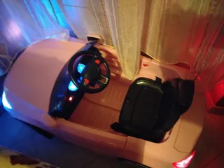 Macchina elettrica per bambini rosa