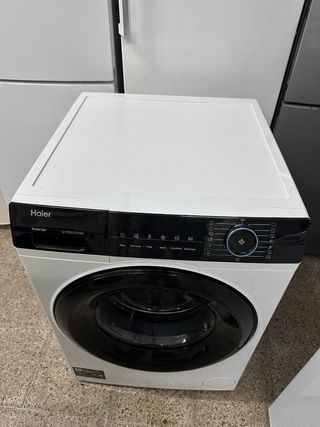 Lavadora Haier Inverter Blanca con grantia transpo