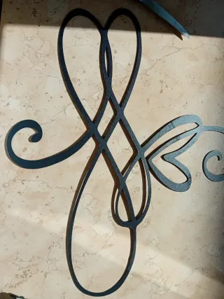 Scultura metallo cuore infinito