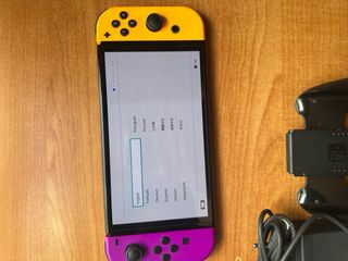 Nintendo Switch OLED Morado/Amarillo