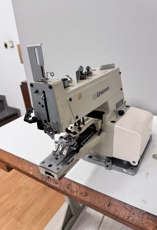 Máquina coser botones industrial