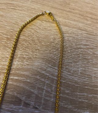 Cadena trenzada chapada en oro