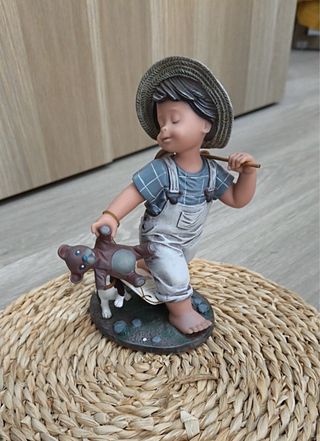 Figura porcelana de Nadal niño con perro y osito