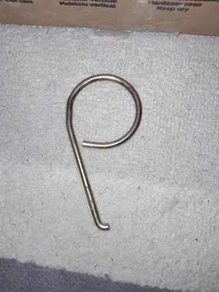 Gancho para tapones de rueda