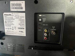 Televisión Philips 28” con soporte pared y mando.