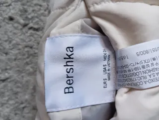 Chaleco reversible beige y negro