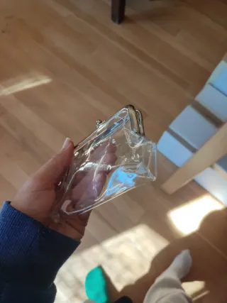 Monedero transparente con cierre metálico