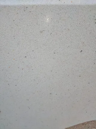 Encimera mármol Cosentino lavabo baño aseo