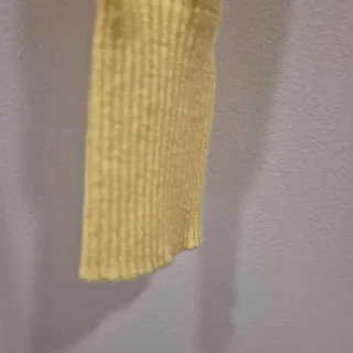Saco corto manga larga amarillo