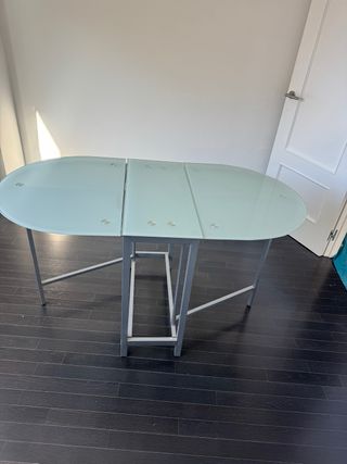 Mesa extensible cristal y metal