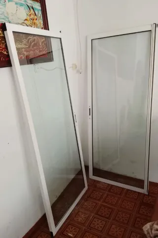 Puerta corredera de cristal