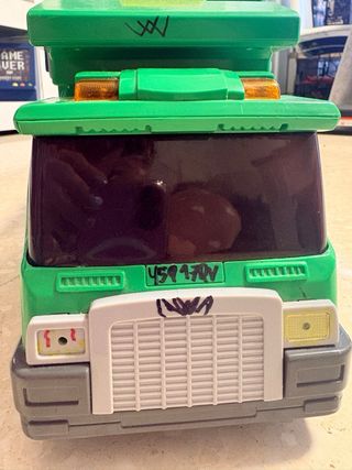 Camión de basura de juguete verde