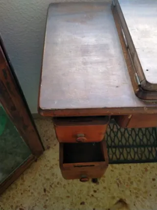 Máquina de coser Singer antigua ocultable