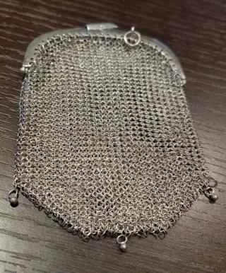 Monedero limosnera doble de plata.