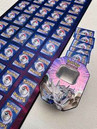 Lotto carte Pokemon vintage e latta Dialga