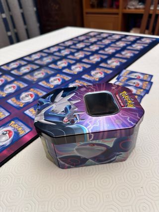 Lotto carte Pokemon vintage e latta Dialga