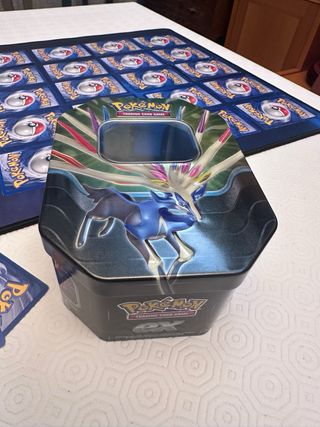 Lotto carte Pokemon vintage e latta Dialga