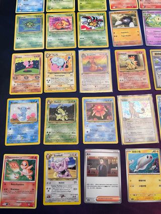 Lotto carte Pokemon vintage e latta Dialga