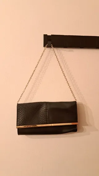 Bolso de fiesta negro y dorado