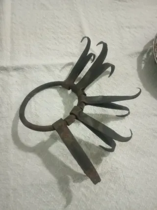 Rebañadera de metal antigua