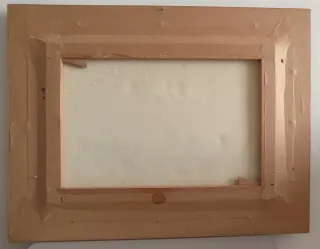 Cuadro de un paisaje con su marco de madera.