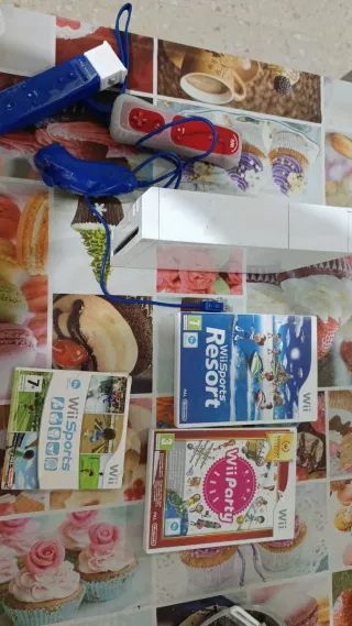 Consola Wii con mandos y juegos