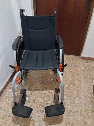 Silla de ruedas  y cama articulada