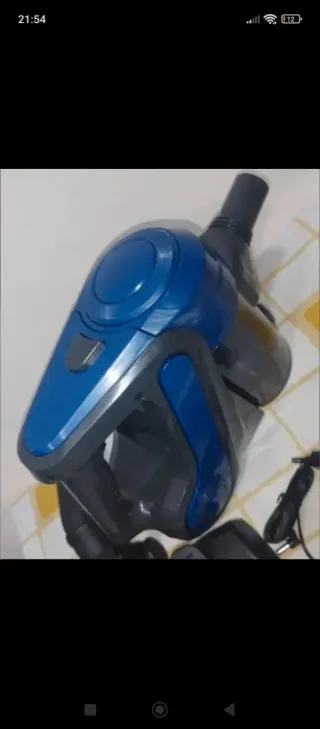 Aspirador de mano azul