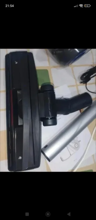 Aspirador de mano azul