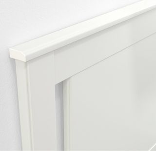 Cama doble de madera blanca