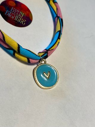 Braccialetto colorato con ciondolo cuore azzurro