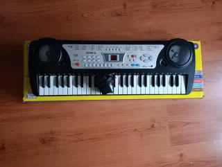 Super teclado electrónico music planet