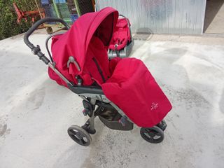 Trio Neonato, passeggino e ovetto rosso