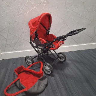 Carrito de muñecas rojo y negro