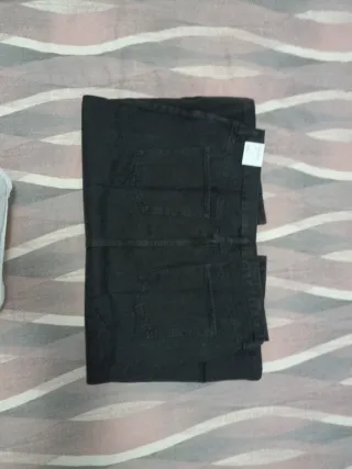 Falda vaquera Mango Talla XXL.Mide 50cm de cintura