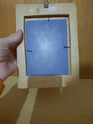 Specchio con cornice indonesiana