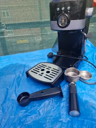 Cafetera para reparar o piezas