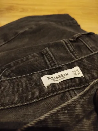 Pantalones vaqueros negros campana