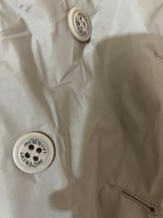 Giacca beige doppiopetto con volant