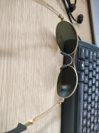 Gafas de sol Ray-Ban Orbs doradas y negras