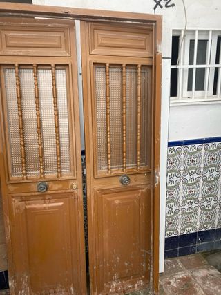 Puerta doble entrada hierro con cristal 135x210