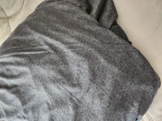 Funda de sofá multicolor y verde azulado