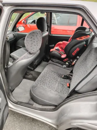 Citroen Saxo 2002, cambio por moto scuter 125.