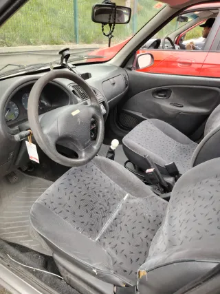 Citroen Saxo 2002, cambio por moto scuter 125.