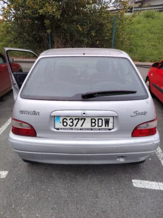 Citroen Saxo 2002, cambio por moto scuter 125.