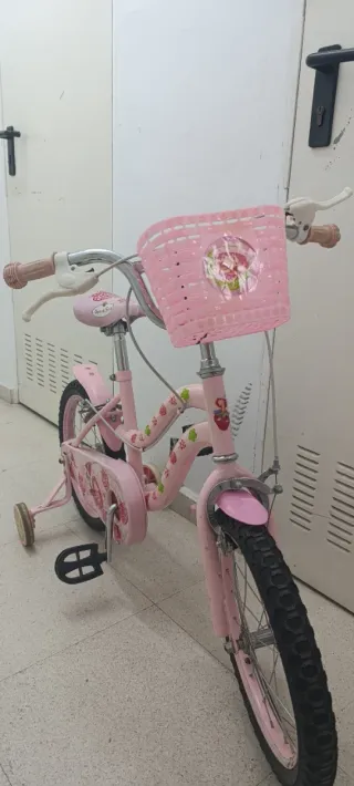 Bicicleta niña rosa con cesta