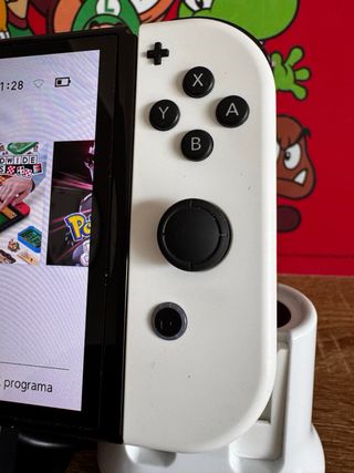 Nintendo Switch OLED COMO NUEVA Caja y accesorios